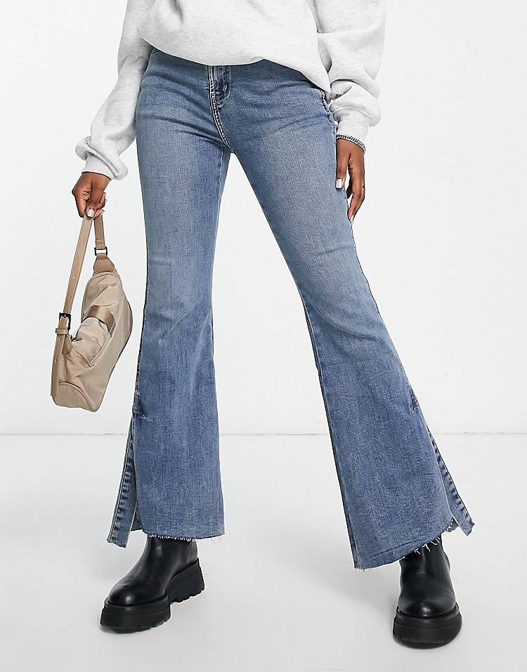 Urban Revivo flare jeans with split hem detail in blue